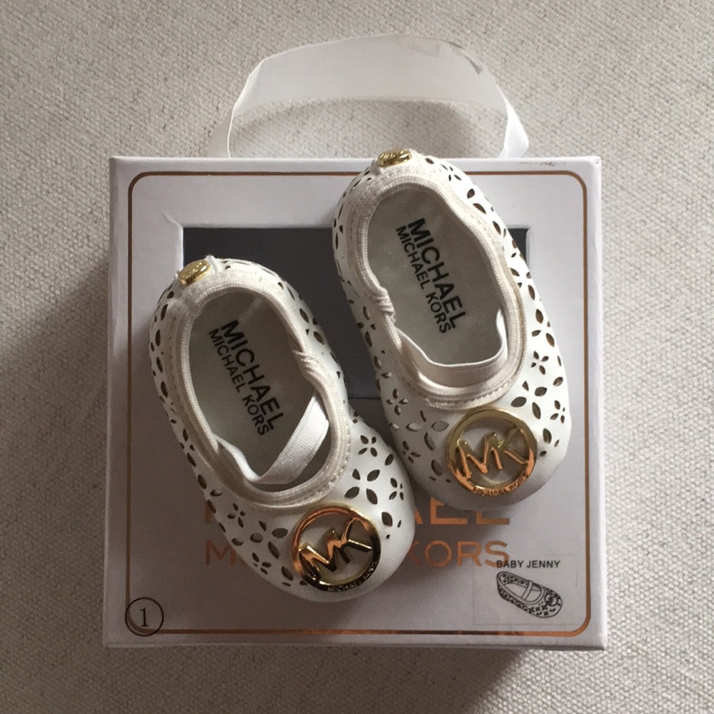 Michael Kors baby shoes. White and gold flats.